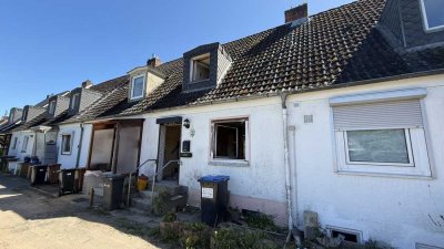Sanierungsbedürftiges Reihenhaus