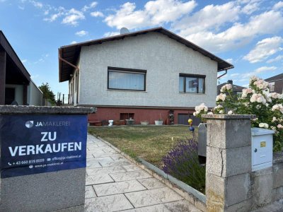 Familienhit! Gepflegtes Einfamilienhaus mit Garage und großem Grundstück
