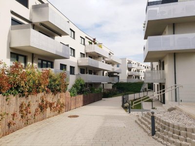 Neuwertige Wohnung mit Terrasse + Tiefgaragenplatz!