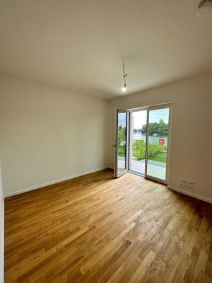 Wohnen am Wasser – moderne Wohnung mit Garten und Havelblick