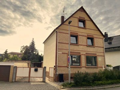 Charmantes Einfamilienhaus mit Garten und EBK in Dreieich-Sprendlingen