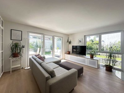 Stilvoll wohnen auf zwei Ebenen- Charmante und hochwertige 4-Zimmerwohnung mit Garten Kamin und Einb