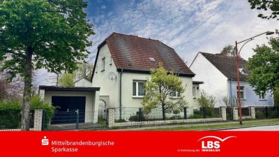 Einfamilienhaus und 2. Baugrundstück