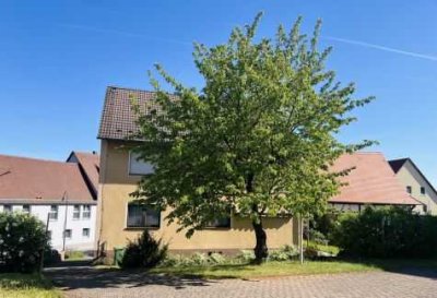 Einfamilienhaus mit drei Wohnungen und großzügigem Grundstück