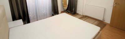 Geschmackvolle, sanierte 1,5-Zimmer-Wohnung mit geh. Innenausstattung mit Balkon und EBK