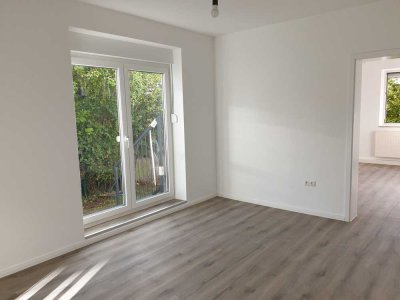 3-Zi-Gartenwohnung mit Südterrasse, EBK & Sonnenplatz für Selbstversorger