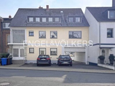Dreifamilienhaus mit Nebengebäude und Grundstück für eine mögliche Bestandserweiterung