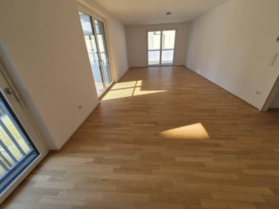 Zentral gelegene 4 Zimmer Wohnung mit großer Terrasse und Gartenanteil, Erstbezug!