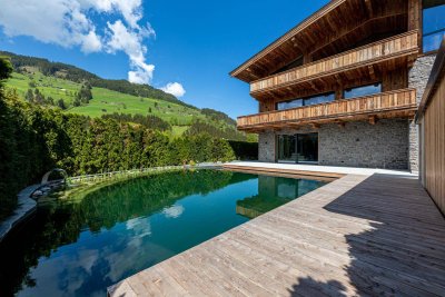 Edle Residenzen in Aurach - Top 1 Gartenwohnung mit Schwimmteich