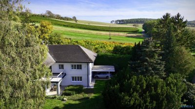 Exklusives Wohnen in Oberrohrbach – Traumhafter Ausblick &amp; Weingartenlage