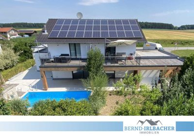 Zweifamilienhaus mit Garten, Pool und PV-Anlage - attraktive Kapitalanlage in ruhiger Lage