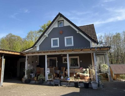 Einfamilienhaus mit zwei Einliegerwohnungen