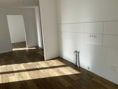 Barrierearme, freundliche 2-Zimmer-Wohnung mit Tiefgaragenstellplatz