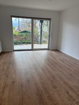 Ihr grünes Paradies: 1-Zi-Wohnung mit großer Wohnküche, Sonnenterrasse & Gartenanteil!