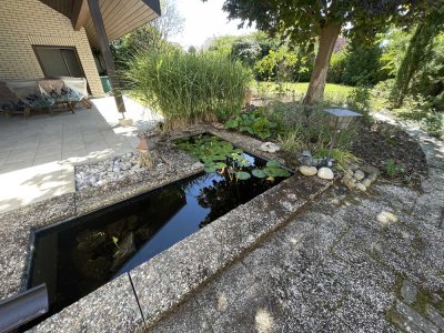 Auf der Sonnenseite des Lebens - 4-Zimmer-Erd- u. Untergeschoss-Wohnung mit Garten und Garage