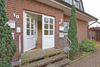 Haus-im-Haus:  Vermietete 3-Zimmer-Wohnung mit begehbarem Keller, Terrasse, Gartenanteil und Carport