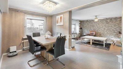 Zweifamilienhaus mit Gewerbeeinheit, großzügigem Grundstück und massivem Nebengebäude