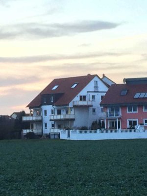 Traumhafte Dachgeschoss-Maisonette-Wohnung mit Seeblick in Lu-Melm
