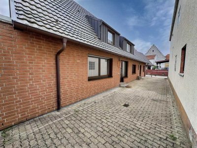 Familienfreundliches Wohnen mit Garten und Carport!