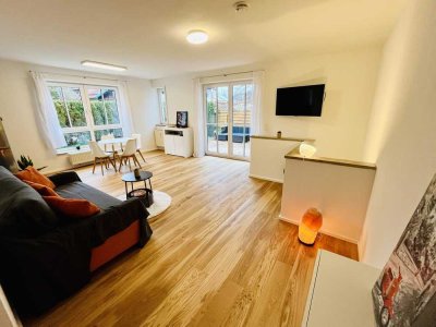 RESERVIERT 2 Zimmer + Hobbyraum: Gartenwohnung mit 105 qm Wohn-Nutzfläche & Sauna