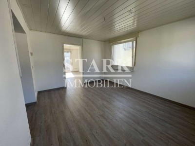 **SOLIDES MEHRGENERATIONENHAUS MIT SONNENGARTEN**