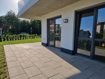 Kapitalanlage - Erdgeschoss-Eigentumswohnung mit Garten, Tiefgaragen- & Außenstellplatz