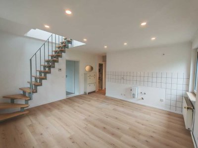 Frisch renovierte Maisonettewohnung mit Galerie und privatem Gartenanteil