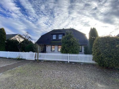 Familienfreundliches Einfamilienhaus mit Grundstück in beliebter Wohngegend zu verkaufen