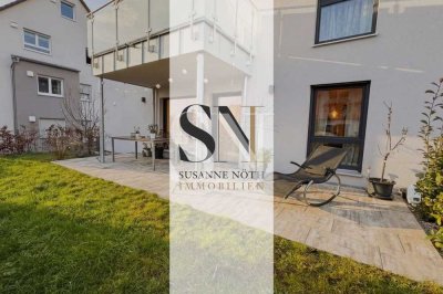 Neuwertige 2-Zimmerwohnung mit Terrasse und Garten