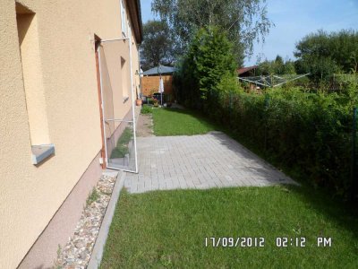 Wohlfühlwohnung im Grünen – 2 Zimmer mit Terrasse