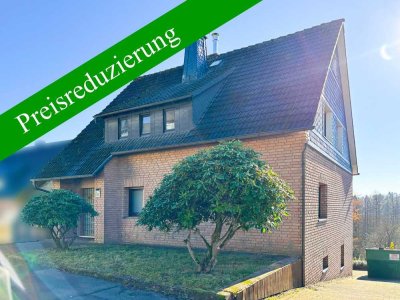 Renovierungsbedürftiges Zweifamilienhaus mit großem Garten in ruhiger Ortsrandlage von Morsbach!