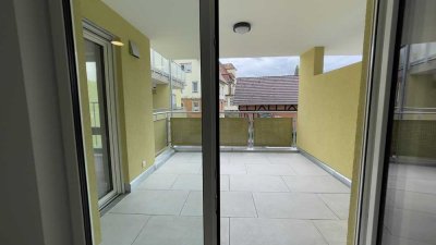 Stadtwohnung! Neubau 3-Zi.- Wohnung mit EBK, Balkon, Tiefgarage und Möglichkeit für E- Mobilität