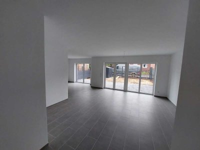 Attraktive 3-Zimmer-Erdgeschosswohnung mit Terrasse, Garten und Aufzug (KfW 55)