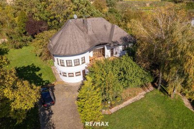 Einzigartiges Haus in Südlage mit unverbaubarem Fernblick auf leichter Hanglage