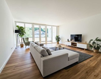Neubaukomfort trifft Wohnqualität: 4-Zimmerwohnung mit Südbalkon und Tiefgaragenstellplatz