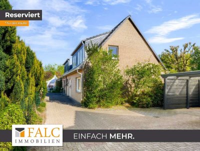 Reserviert! Familienglück in bester Lage - modernisierte DHH mit Garten und Carport