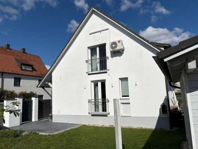 Einfamilienhaus mit vermietetem Gewerbeanteil
