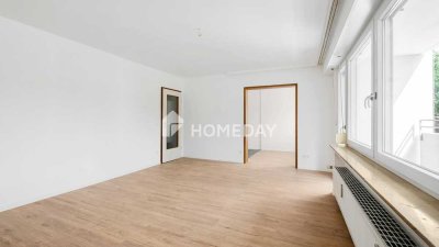 Teil-Renovierte Erdgeschosswohnung mit Loggia, Wintergarten und Tiefgaragenstellplatz