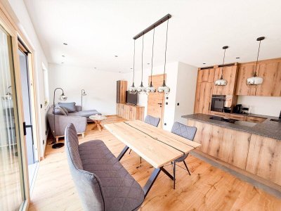 Erstbezug - Zauberhafte vollmöblierte Gartenwohnung in traumhafter Ausblicklage von Aurach
