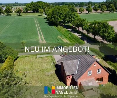 Zweifamilienhaus mit Anbau und Vermietungspotenzial auf weitläufigem Grundstück