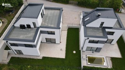 Neubau - Wohnung mit großer Terrasse und Garten