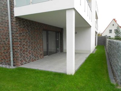 Exklusives Wohnen in Kernstadtnähe: Moderne 3-Zimmer-Wohnung mit Terrasse, Garten und barrierefreiem