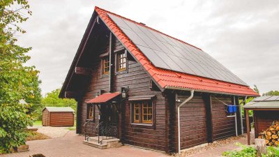 Modernes Holz-Blockbohlenhaus mit großem Grundstück (ehem. Gärtnerei) zum Kauf in Sponholz