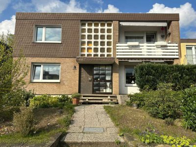 Einladendes Zweifamilienhaus mit sonnigen Terrassen und idyllischem Garten in Steinhagen