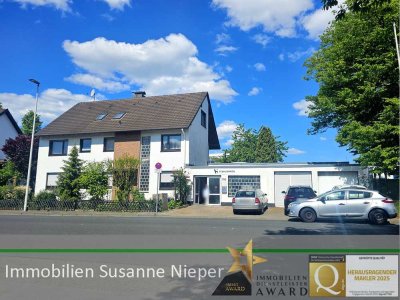 Vielfältige Nutzungsmöglichkeiten. Beziehbares 2-Familienhaus mit vermieteten Betriebsgebäude