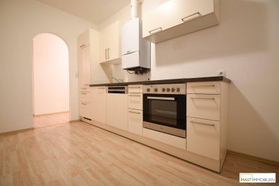 Optimal aufgeteilte 2-Zimmer Balkonwohnung in Ebergassing inkl. Neuer Küche mit Geräten und erneuerter Vaillant Therme