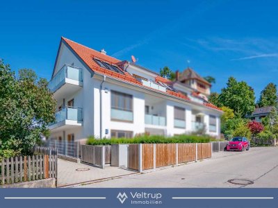 EIN ZUHAUSE ÜBER DEM SEE: DACHGESCHOSSWOHNUNG MIT SEEBLICK