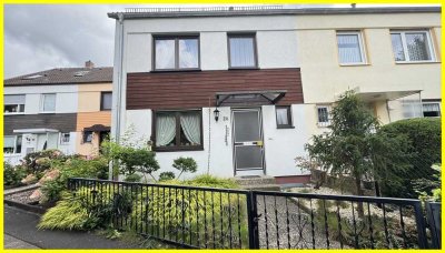 Familienfreundliches Reihenmittel haus mit schönem Grundstück und Garage