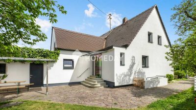 Doppelhaushälfte in Gartenidylle mit Baugenehmigung zur Erweiterung