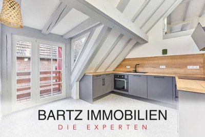 Sonnenparadies: Lichtdurchflutete Dachgeschosswohnung im modernisierten Fachwerkhaus